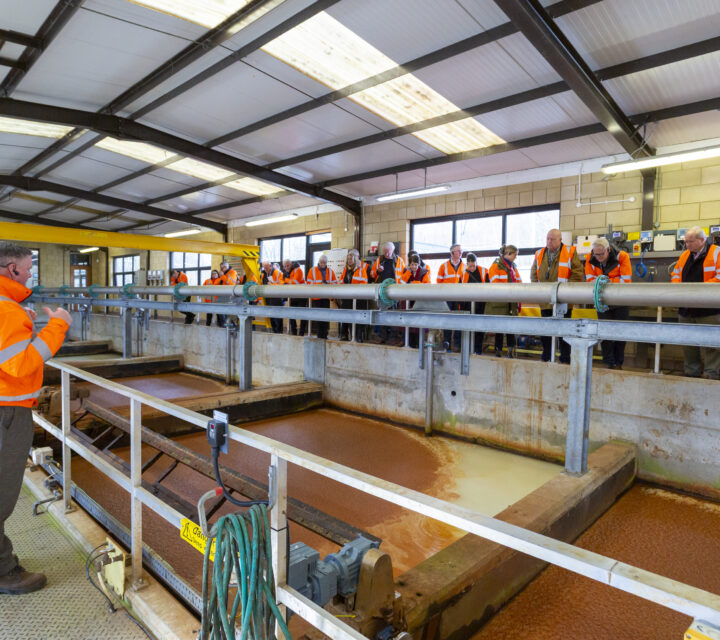 Customers listening to a water treatment works tour