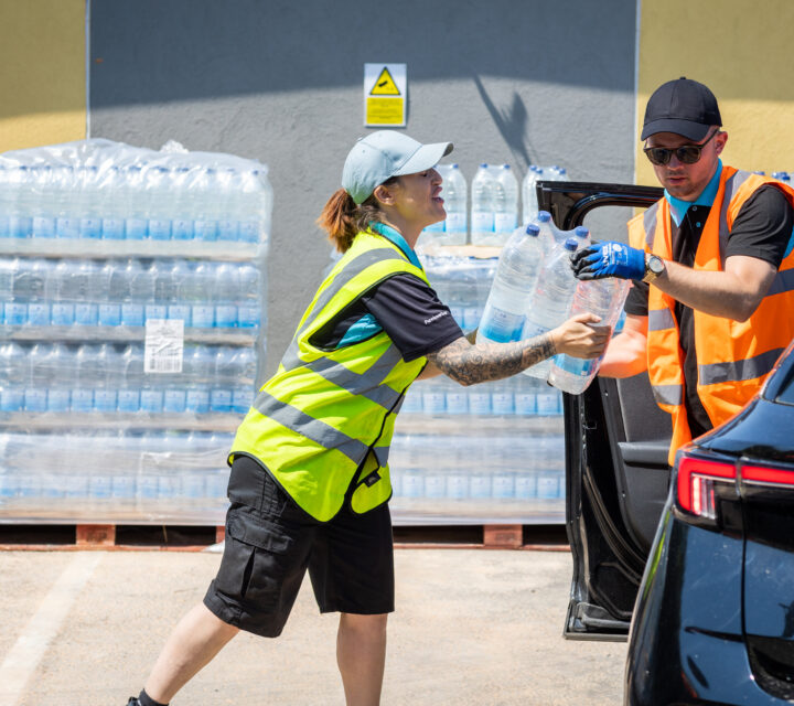 Bottled water being handed out